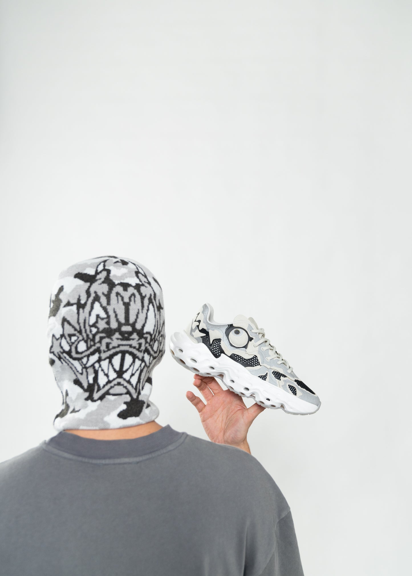 Flowers for Society Dragon Balaclava Ore Mob collaboration grey black white backview worn by model Ben