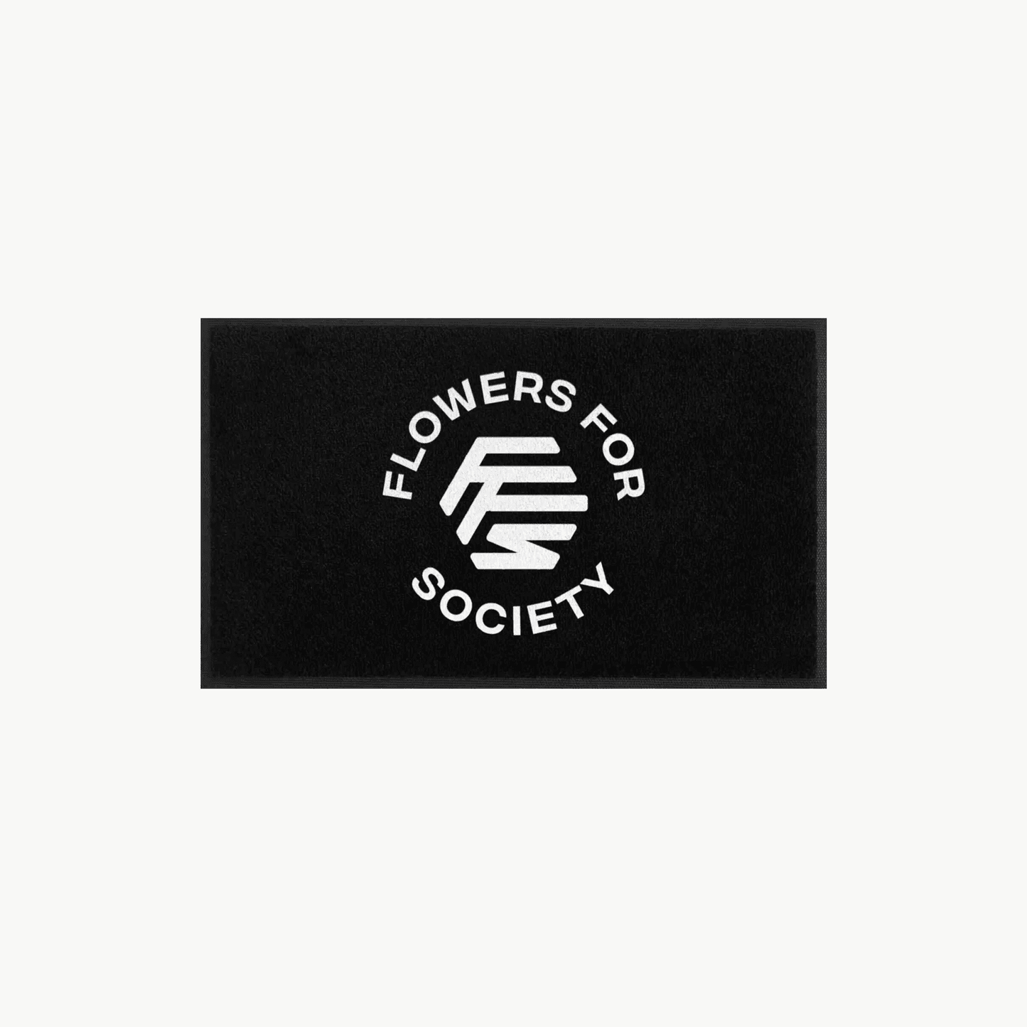 Flowers For Society door mat white logo on black ground topview