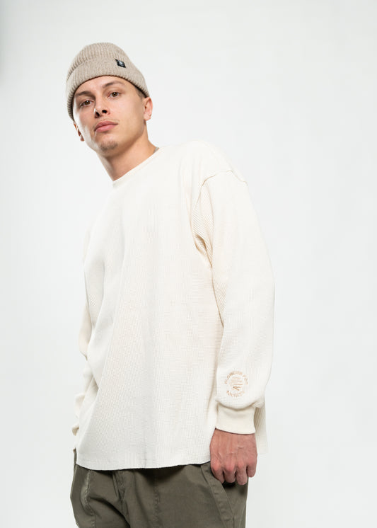 Flowers for Society waffle longsleeve off white side view worn by model Ben standing