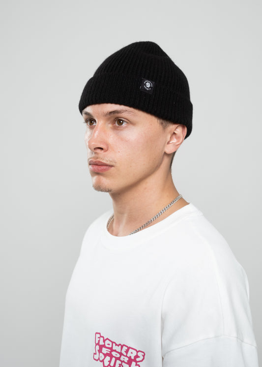 Flowers for Society beanie black sideview worn by model Ben