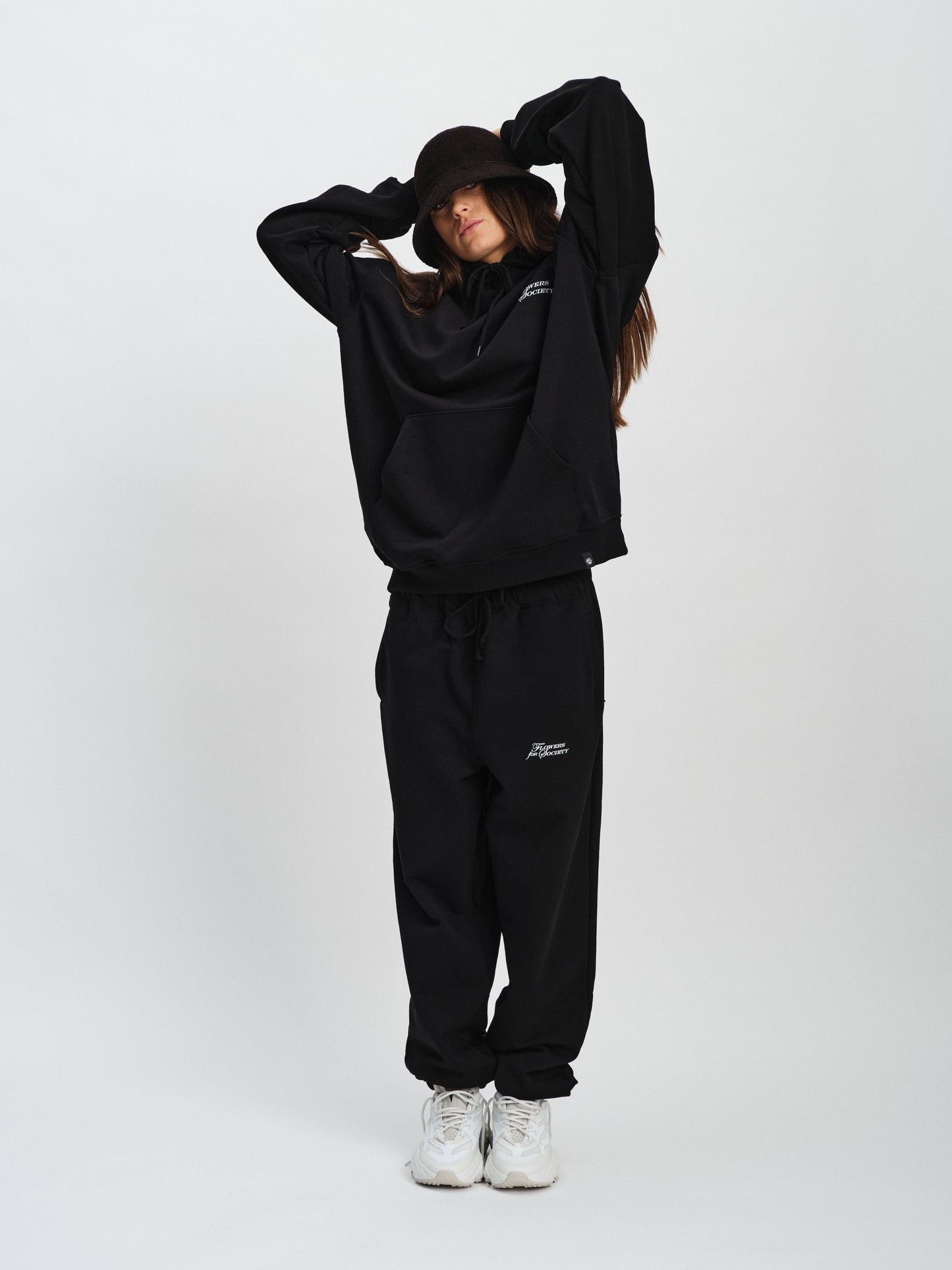 Flowers for Society bouquet hoodie black front view worn by model Imke