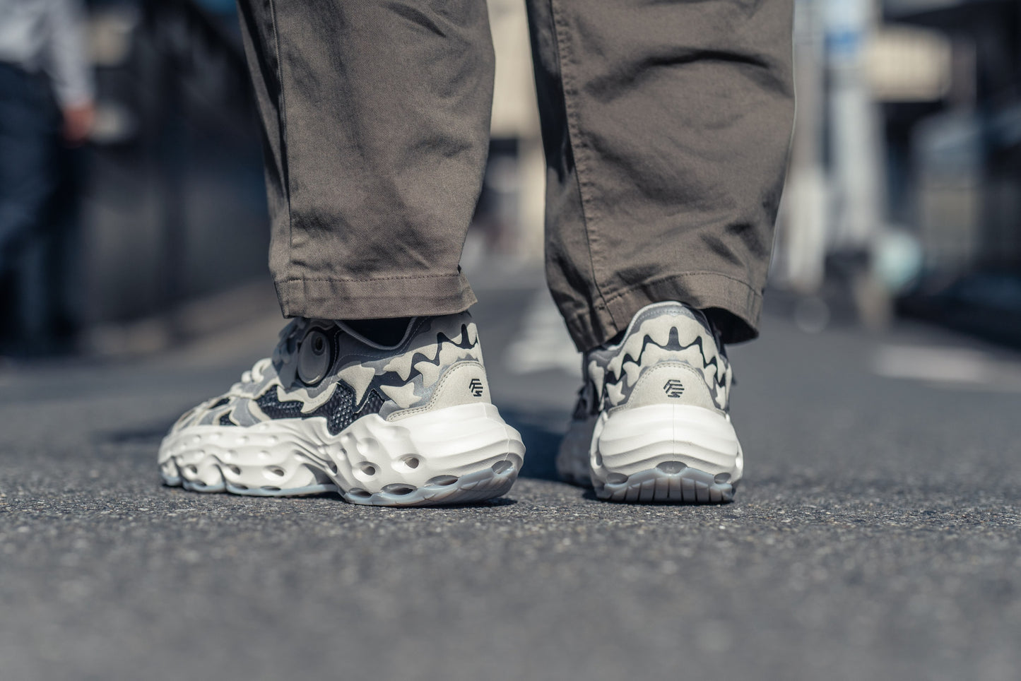 Flowers for Society Sneaker Seed.One Bone Dragon collaboration Oremob backview worn by model standing on the street