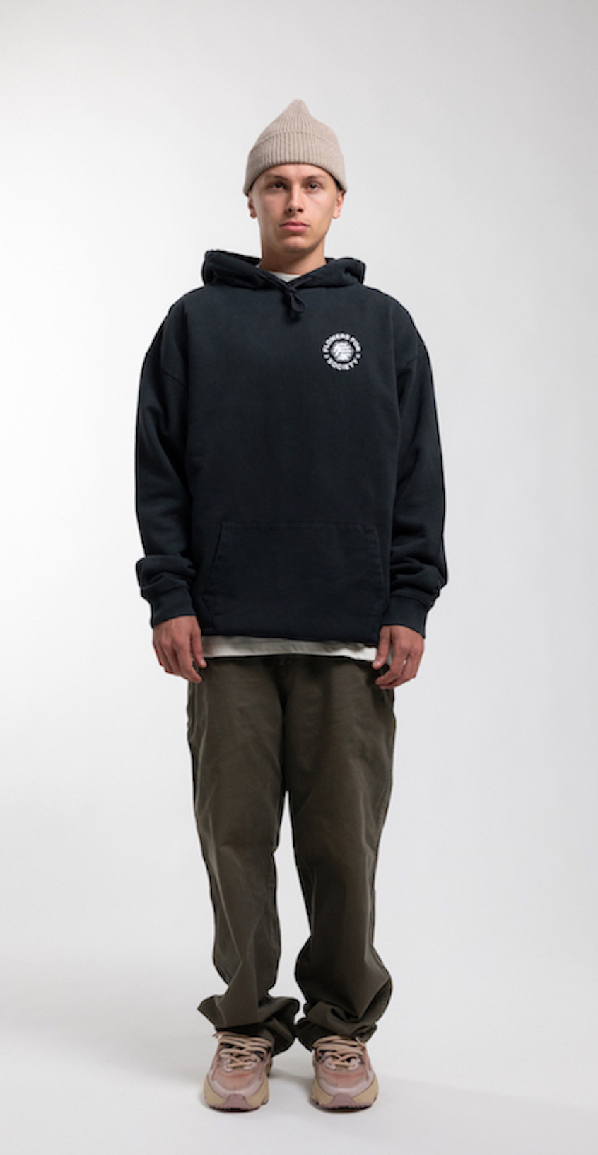 Flowers for Society basic chest print hoodie black front view worn by model Ben
