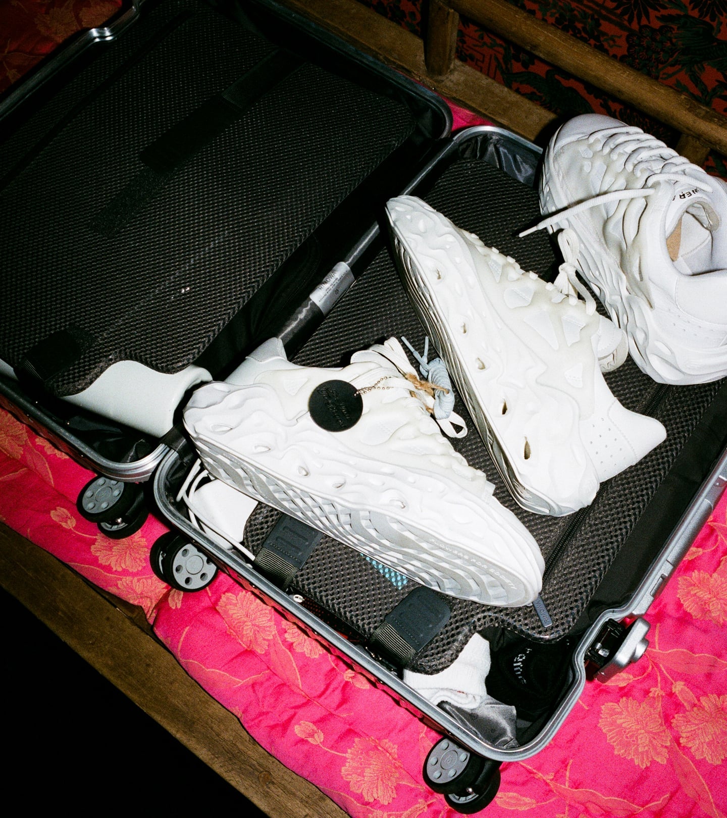 Radicle OG Sneaker in an open suitcase