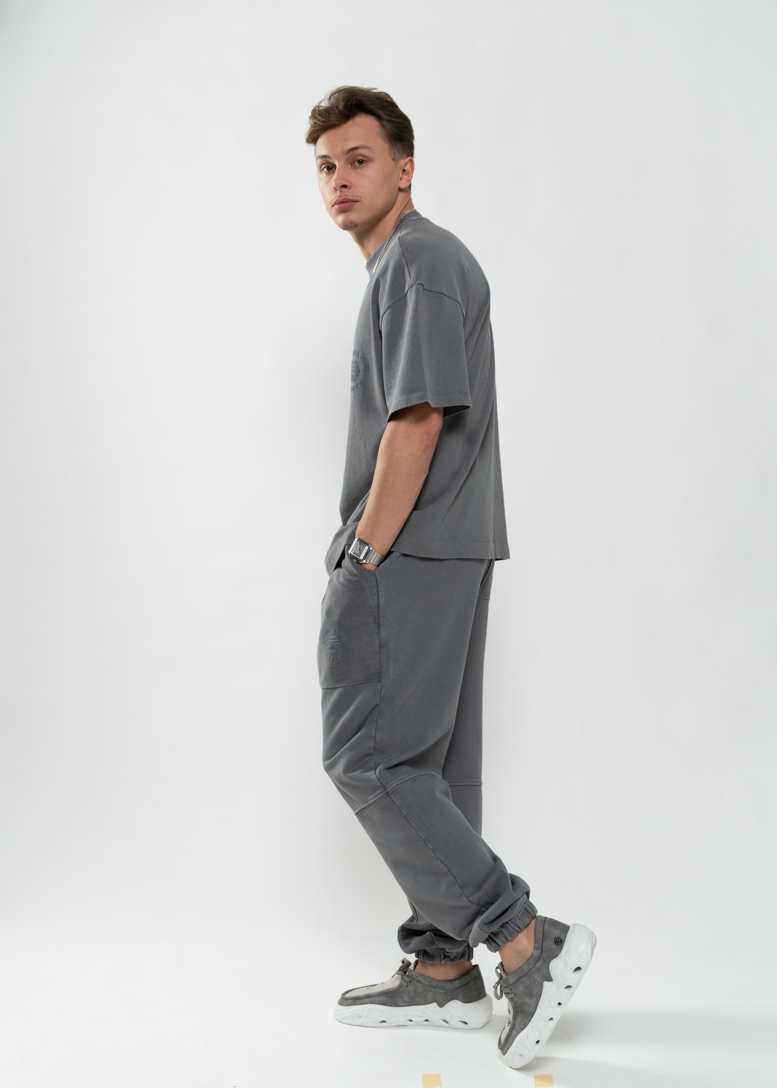 Flowers for Society Basic Jogger pant washed grey lateral view worn by model Ben standing