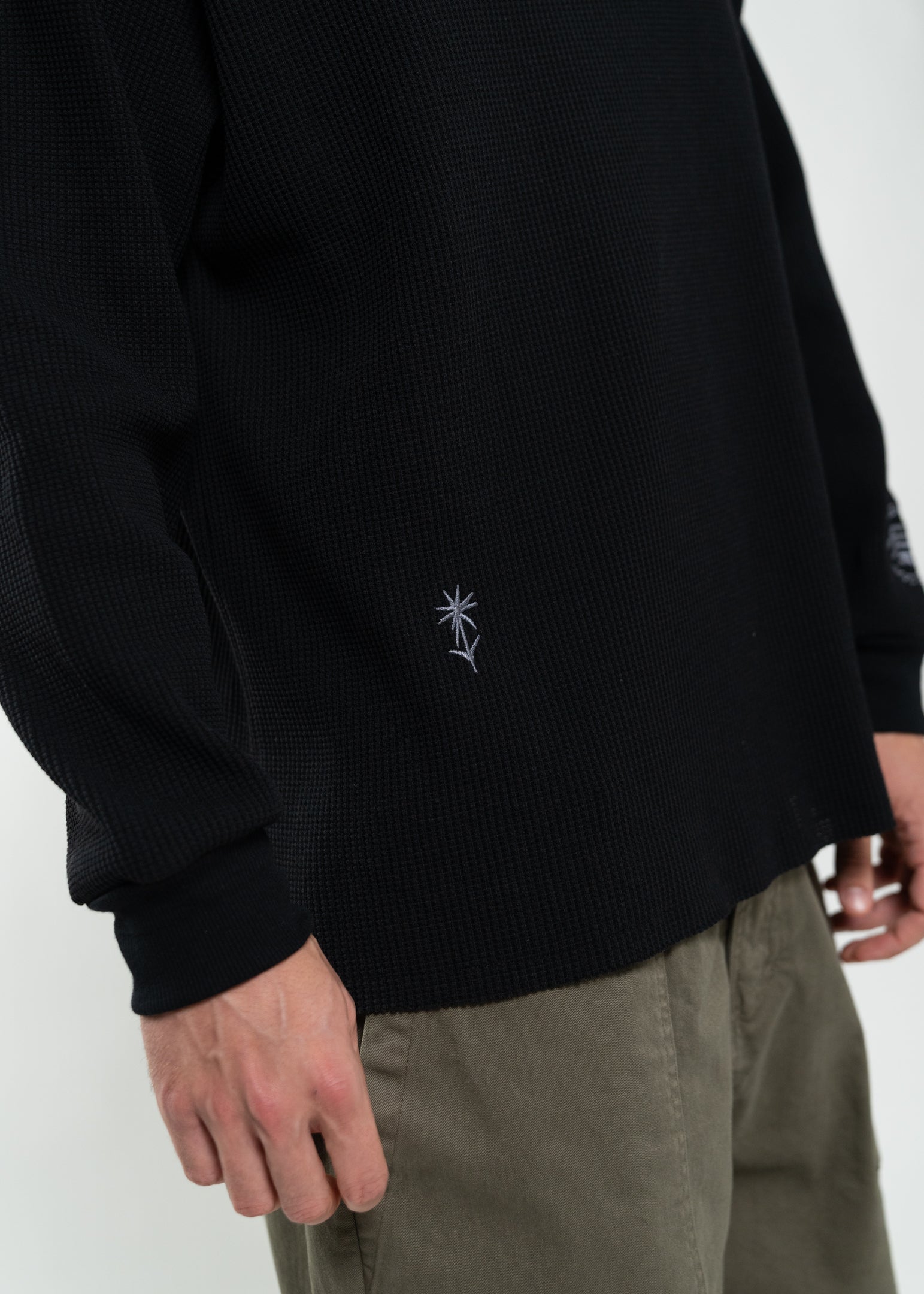 Flowers for Society waffle longsleeve black side view detailed shot flower radicle logo worn by model